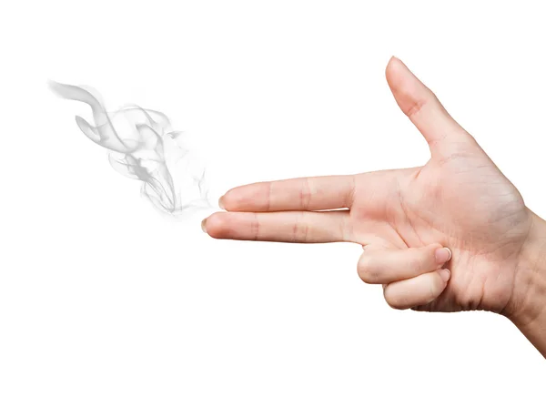 Woman hand showing gun gesture with smoke — Stock Photo, Image