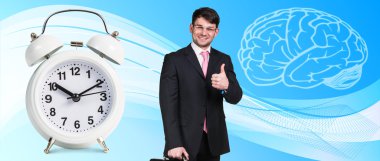 İşadamı klasik çalar saatin yanında