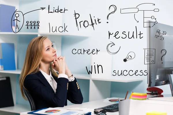 Woman sitting at the desk with computer — Stock Photo, Image