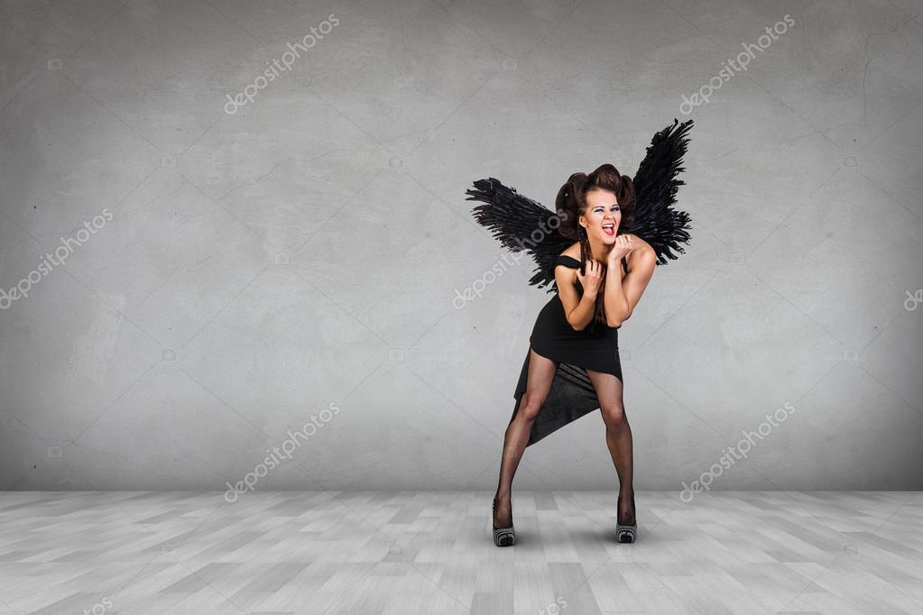 Темный ангел с черными крыльями — Стоковое фото © kotin