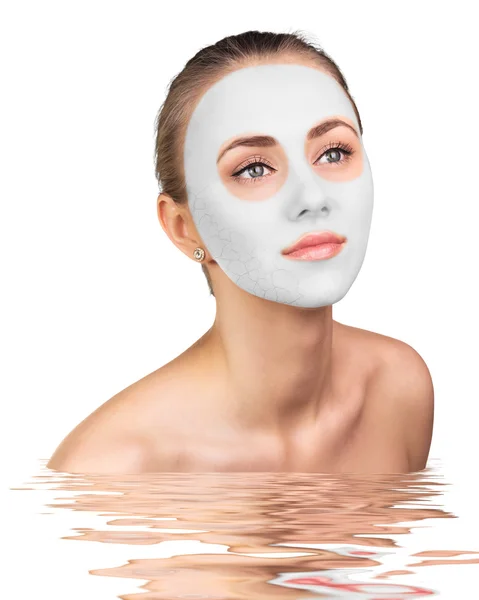 Young woman with clay face mask — Stock Photo, Image