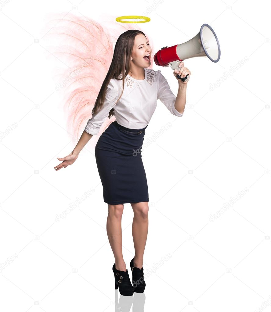 Business woman angel screams to megaphone