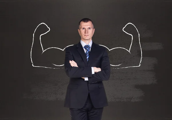 Businessman with drawn powerful hands — Stock Photo, Image