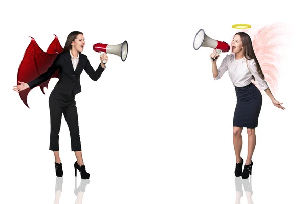 Portrait of angel and devil girls — Stock Photo, Image