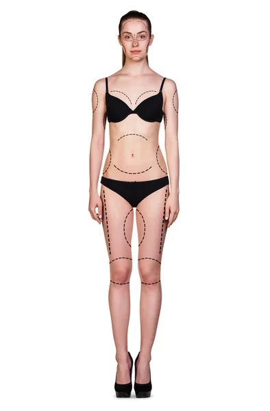 Woman in black underwear with arrows — Stock Photo, Image