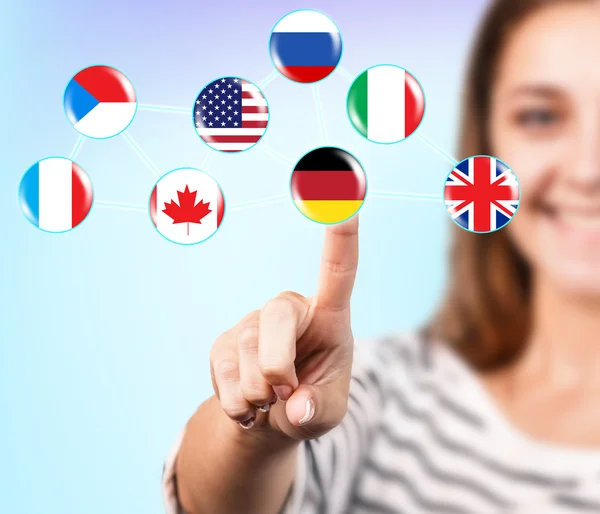 La mujer elige sobre la bandera — Foto de Stock