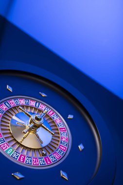 Kumarhane teması, ruleti kapat, kırmızı ve siyah numaralar. Mavi arkaplan.