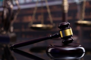 Law theme. Court library - gavel of the judge, scale and books.