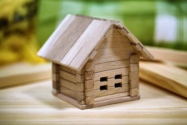 Design wooden cottage. Small children\'s home with wood details.