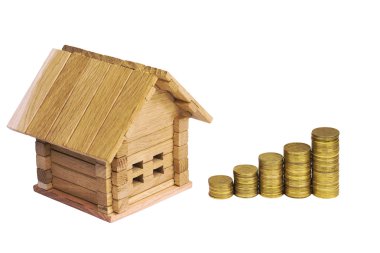 Ahşap ev blok sikke ile. (finans, özellik ve ev kavramı borç). Proje rahat ev. Yeni bina ayrıntılarını ve inşaat için para. Yeni bir ev satın alma.