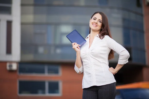 Portrait of pretty student or businesswoman in smart casual usin — Stock Photo, Image