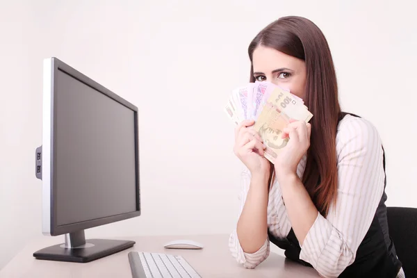 Happy successful Businesswoman in the office holding money with — Stock Photo, Image