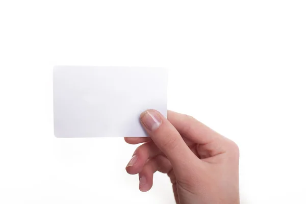 La mano de la mujer sostiene la tarjeta en blanco aislada sobre blanco —  Fotos de Stock