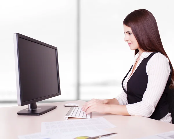 Pretty business woman at office desk — Stock Photo, Image