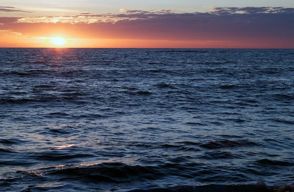 Cloudscape and sunset over the sea — Stock Photo, Image