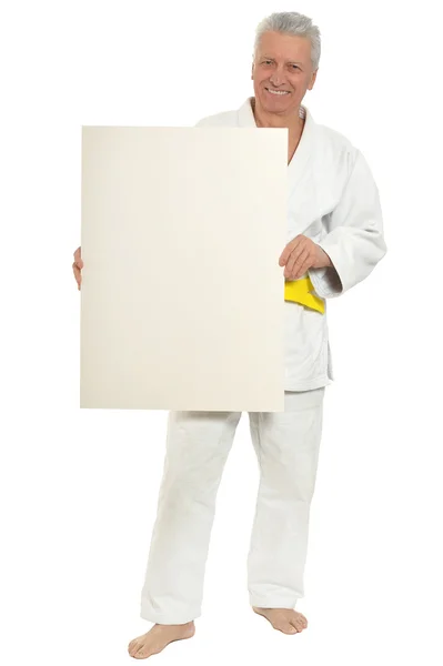 Karate  Senior man   with poster — Stock Photo, Image