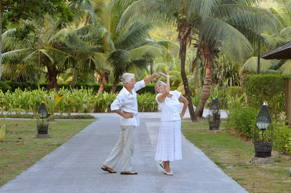 Senior couple near hotel resort — Stock Photo, Image