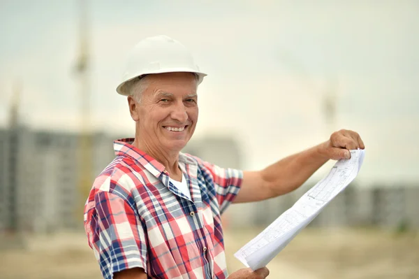 Senior man in under construction — Stock Photo, Image