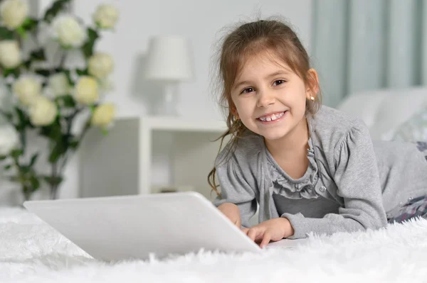 Cute little girl with   laptop — Stock Photo, Image