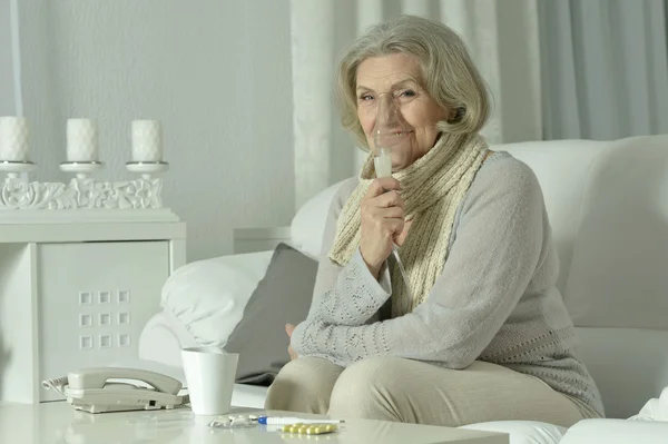 Elderly woman with flu inhalation — Stock Photo, Image