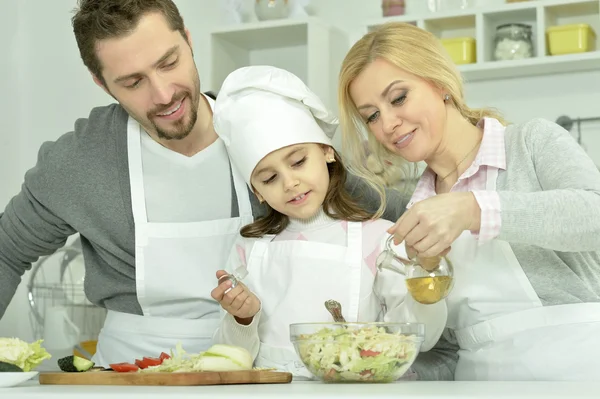 Happy family cooking  in kitchen — Stock Photo, Image