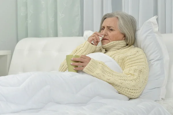 Sick senior woman  with  tea — Stock Photo, Image