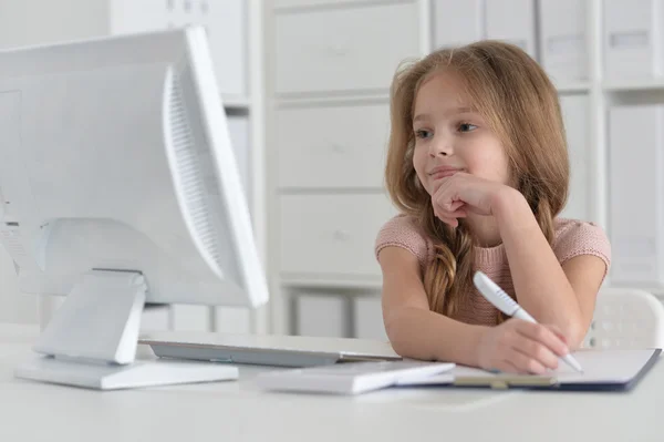 Little student girl making homework — Stock Photo, Image