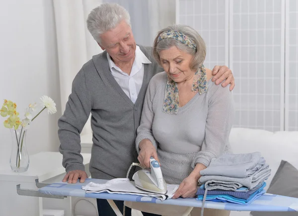 Happy Senior couple ironing — Stock Photo, Image