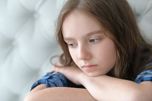 Sad little girl  at home — Stock Photo, Image