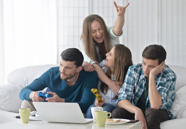 Happy friends and  laptop — Stock Photo, Image