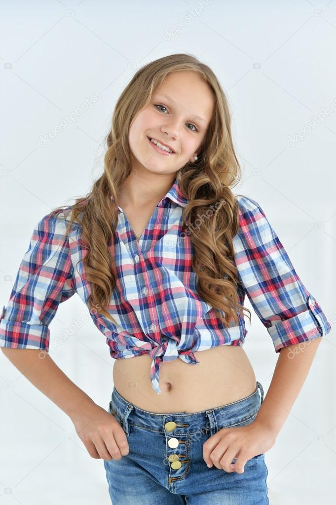 Cute little girl posing Stock Photo by ©aletia 114339902