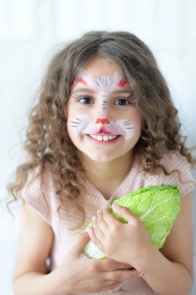 Linda niña con la cara pintada —  Fotos de Stock