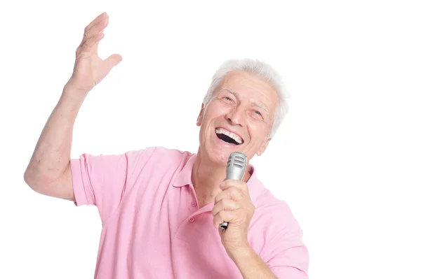 Senior man  singing into microphone — Stock Photo, Image