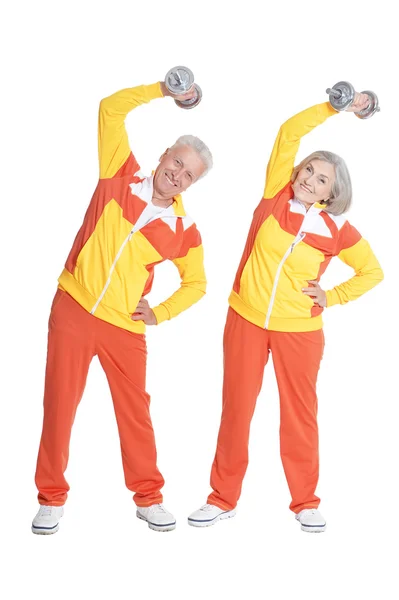 Senior Couple Exercising with dumbbells — Stock Photo, Image