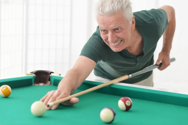 Mature man Playing  billiard — Stock Photo, Image
