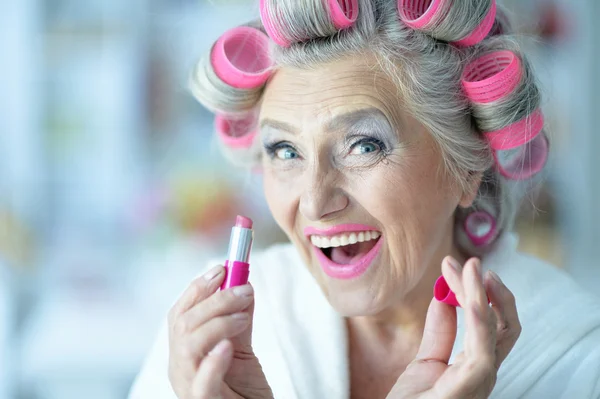Senior woman in  hair rollers — Stock Photo, Image