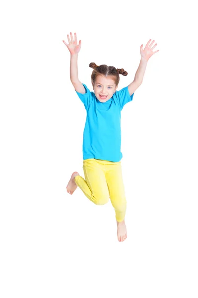 Portrait of cute little girl jumping — Stock Photo, Image