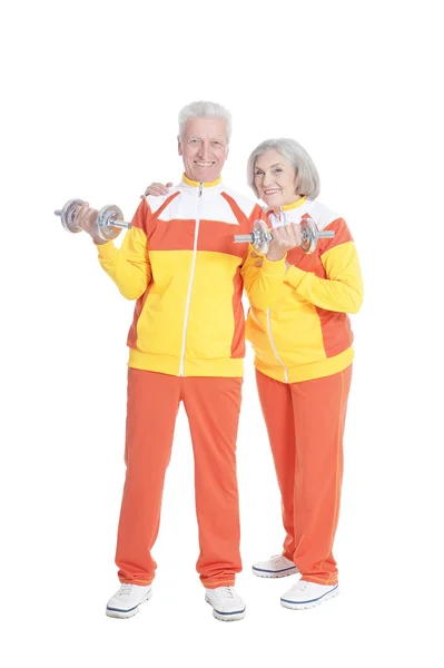 Couple aîné faisant de l'exercice avec haltères — Photo