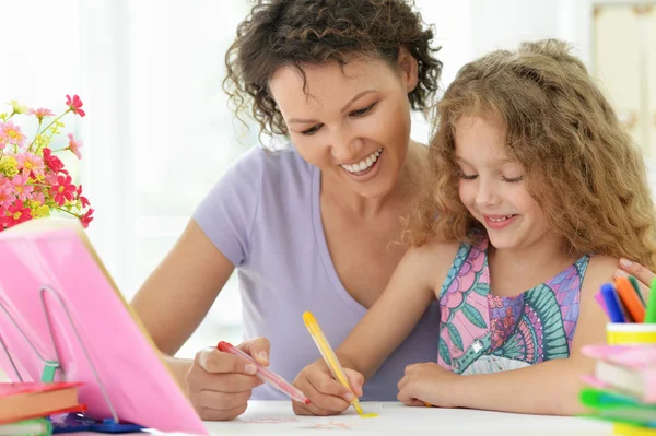 Woman and  girl with colored pencils — Stock Photo, Image