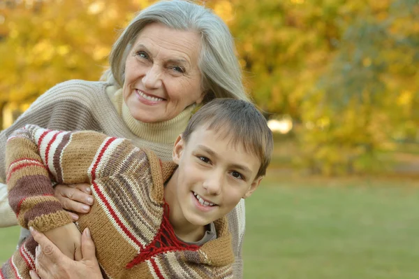 Grandmother with boy  in  park — Stock Photo, Image