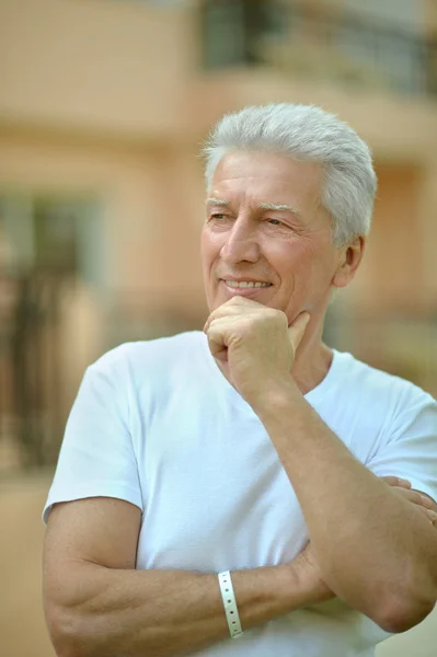 Senior man  in summer park — Stock Photo, Image