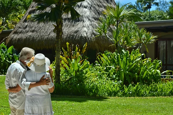 Senior couple near hotel resort — Stock Photo, Image