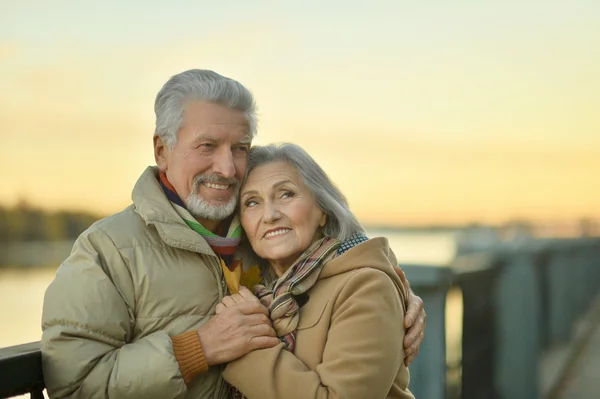 Happy senior couple  near river — Stock Photo, Image