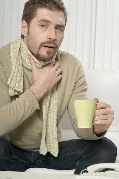 Sick man  drinking warm  tea — Stock Photo, Image