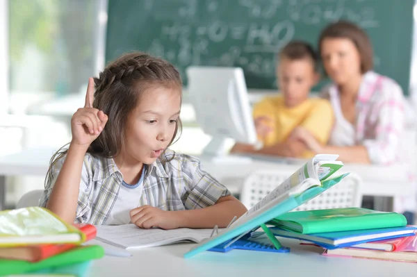 Children at school in the classroom — Stock Photo, Image