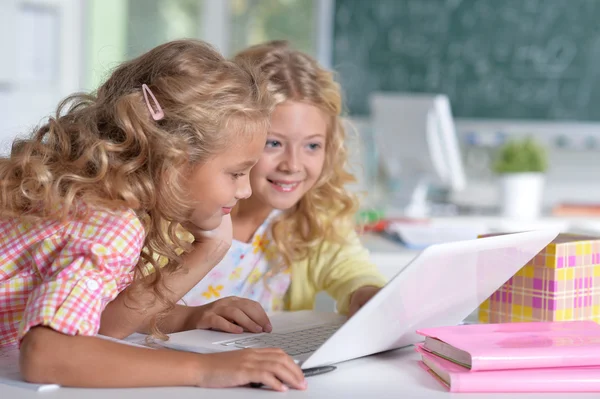 Beautiful little girls at classroom — Stock Photo, Image