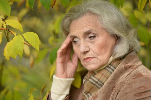 Senior Woman Suffering Headache Park — Stock Photo, Image