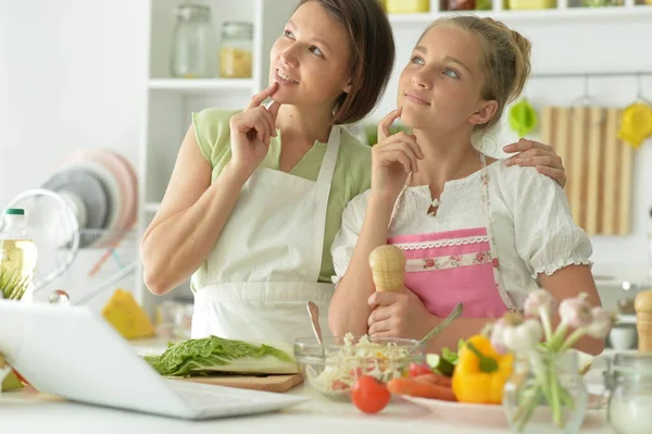 Girl Her Mother Cooking Together Kitchen Table Looking — Stock Photo, Image