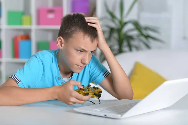 Cute Boy Using Laptop Home Playing Game — Stock Photo, Image