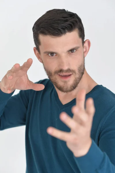 Handsome Young Man Showing Something Studio — Stock Photo, Image